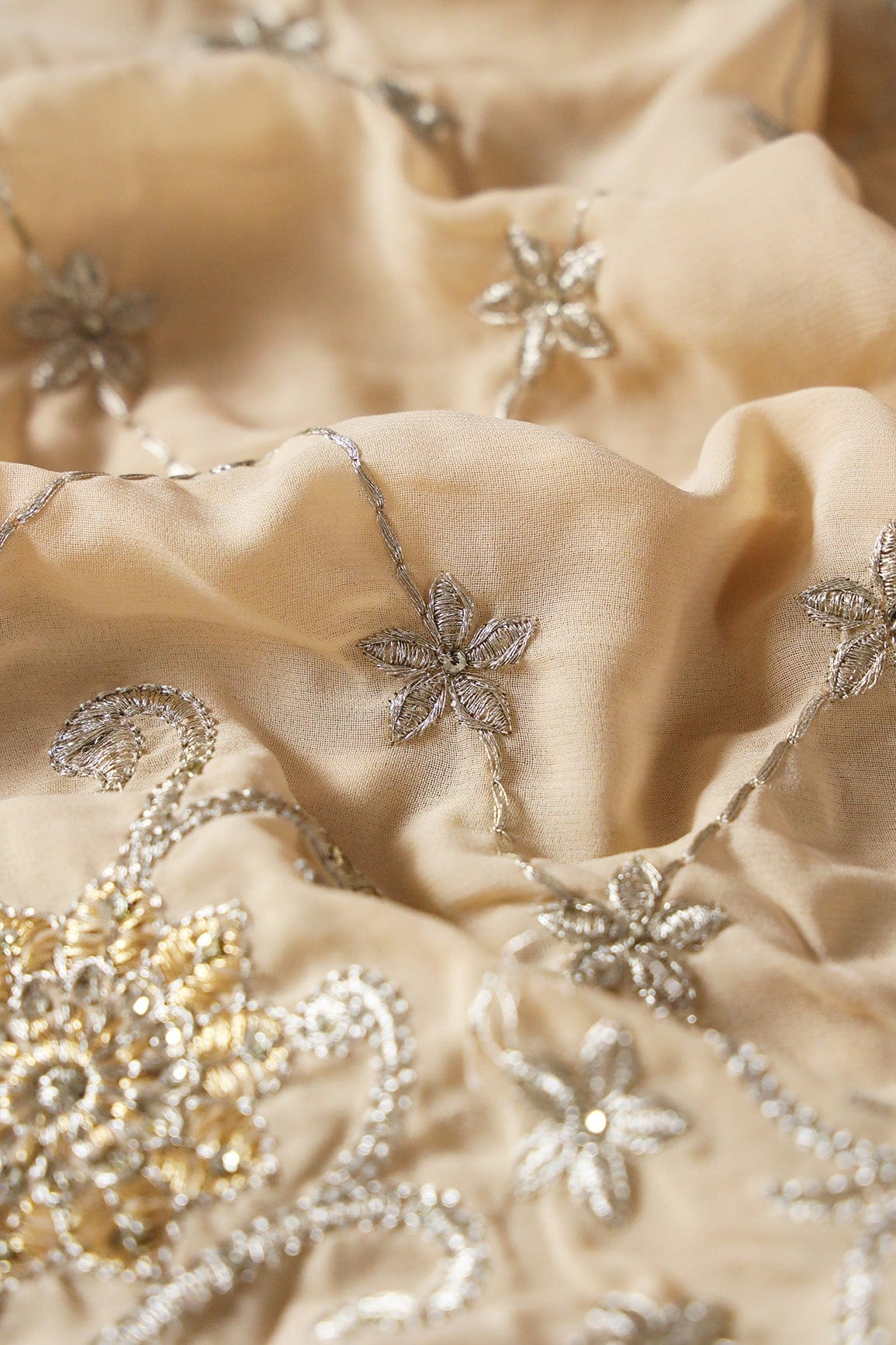 AIzaSyBcstauz-XMPRhEY21AUzeo032pxrXB5Ug - Big Width''56'' Gold And Silver Zari Floral Embroidery Work On Beige Georgette Fabric With Border