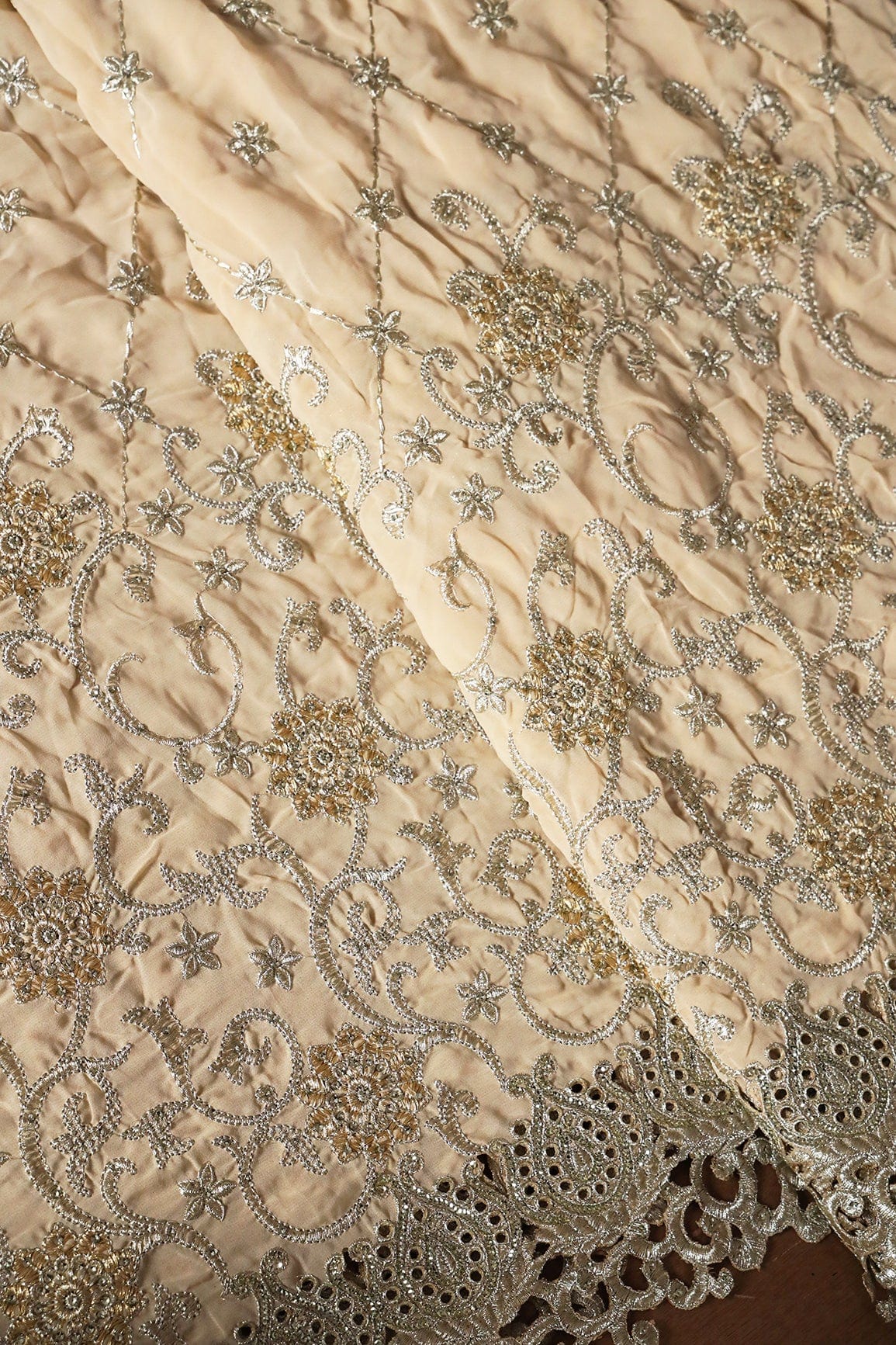 AIzaSyBcstauz-XMPRhEY21AUzeo032pxrXB5Ug - Big Width''56'' Gold And Silver Zari Floral Embroidery Work On Beige Georgette Fabric With Border