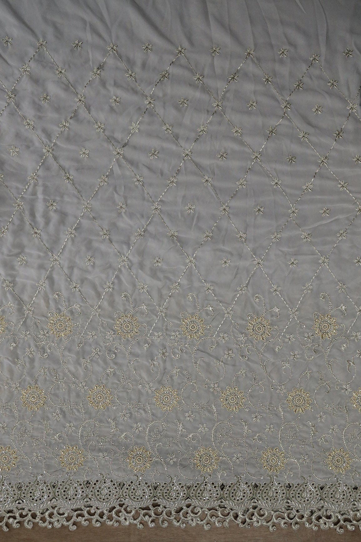 AIzaSyBcstauz-XMPRhEY21AUzeo032pxrXB5Ug - Big Width''56'' Gold And Silver Zari Floral Embroidery Work On Grey Georgette Fabric With Border