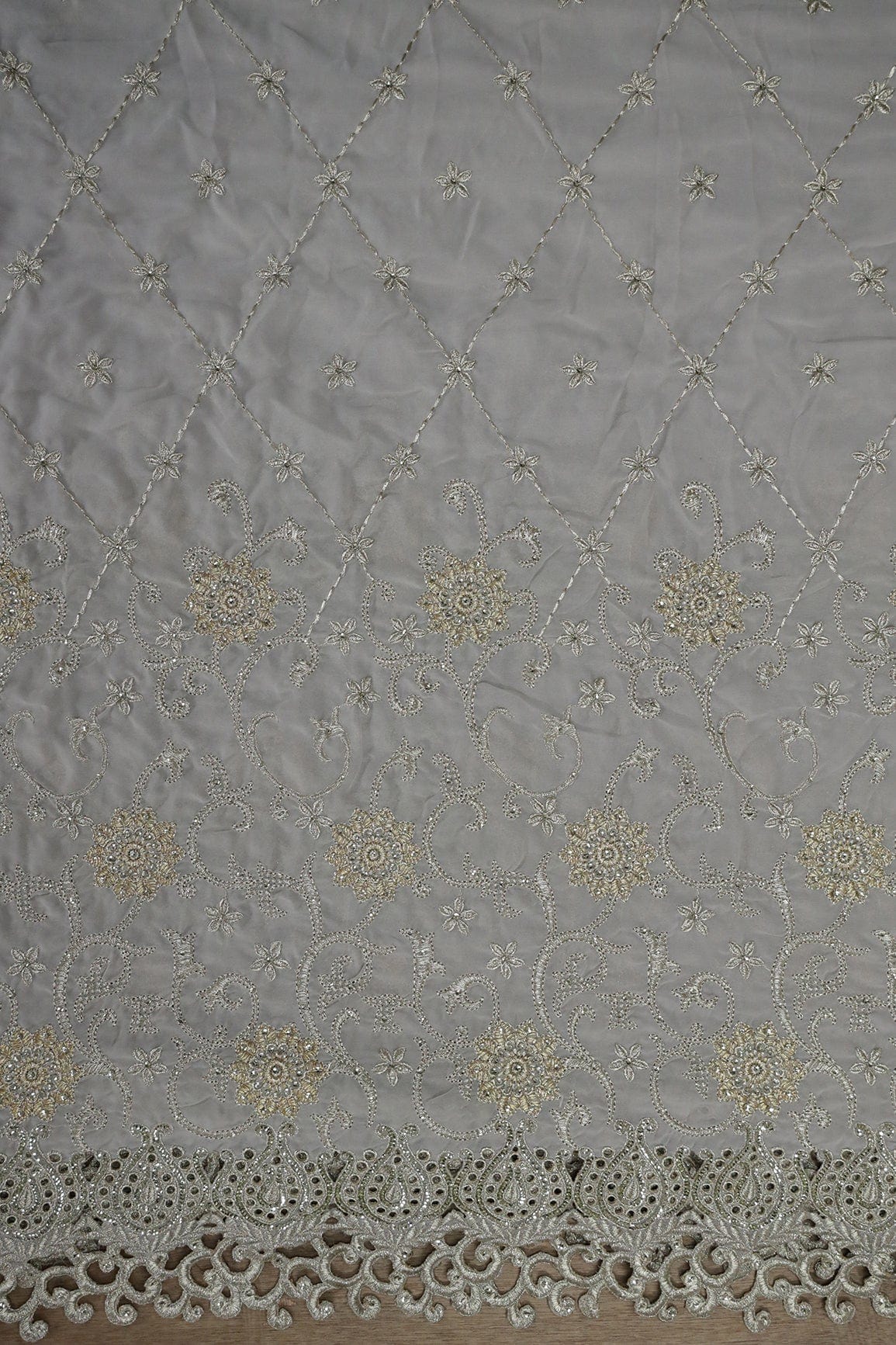 AIzaSyBcstauz-XMPRhEY21AUzeo032pxrXB5Ug - Big Width''56'' Gold And Silver Zari Floral Embroidery Work On Grey Georgette Fabric With Border