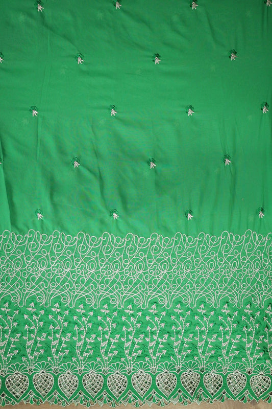 AIzaSyBcstauz-XMPRhEY21AUzeo032pxrXB5Ug - Big Width''56'' Green Thread With Zari Floral Embroidery Work On Green Georgette Fabric With Border
