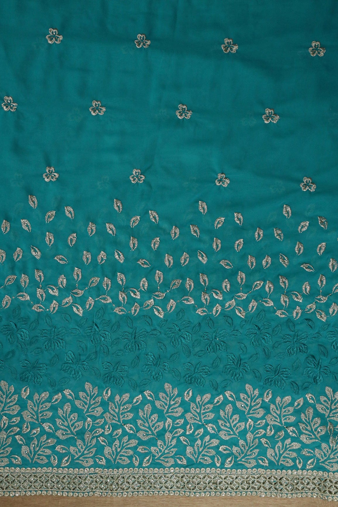 AIzaSyBcstauz-XMPRhEY21AUzeo032pxrXB5Ug - Big Width''56'' Silver Zari Leafy Embroidery Work On Rama Georgette Fabric With Border