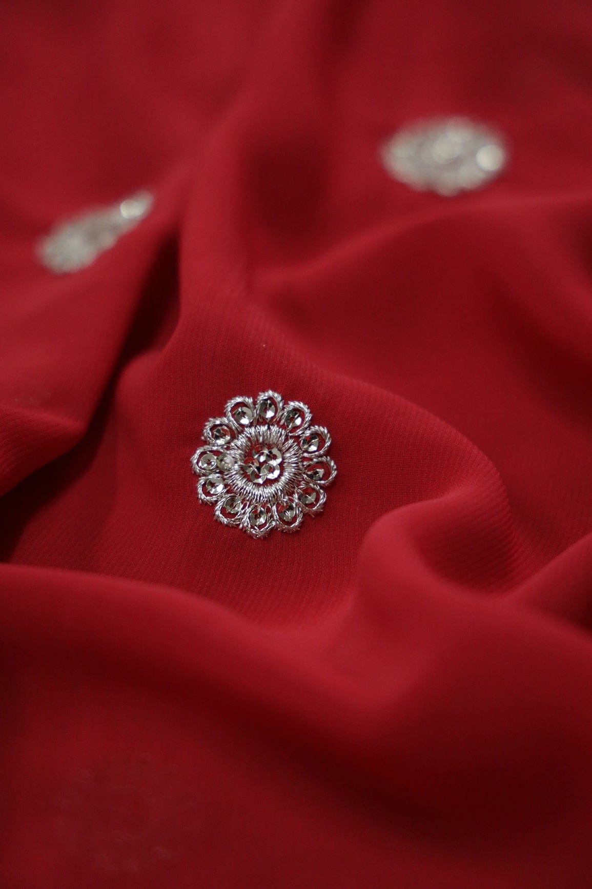 AIzaSyBcstauz-XMPRhEY21AUzeo032pxrXB5Ug - Big Width''56'' Silver Zari Leafy Embroidery Work On Red Georgette Fabric With Border