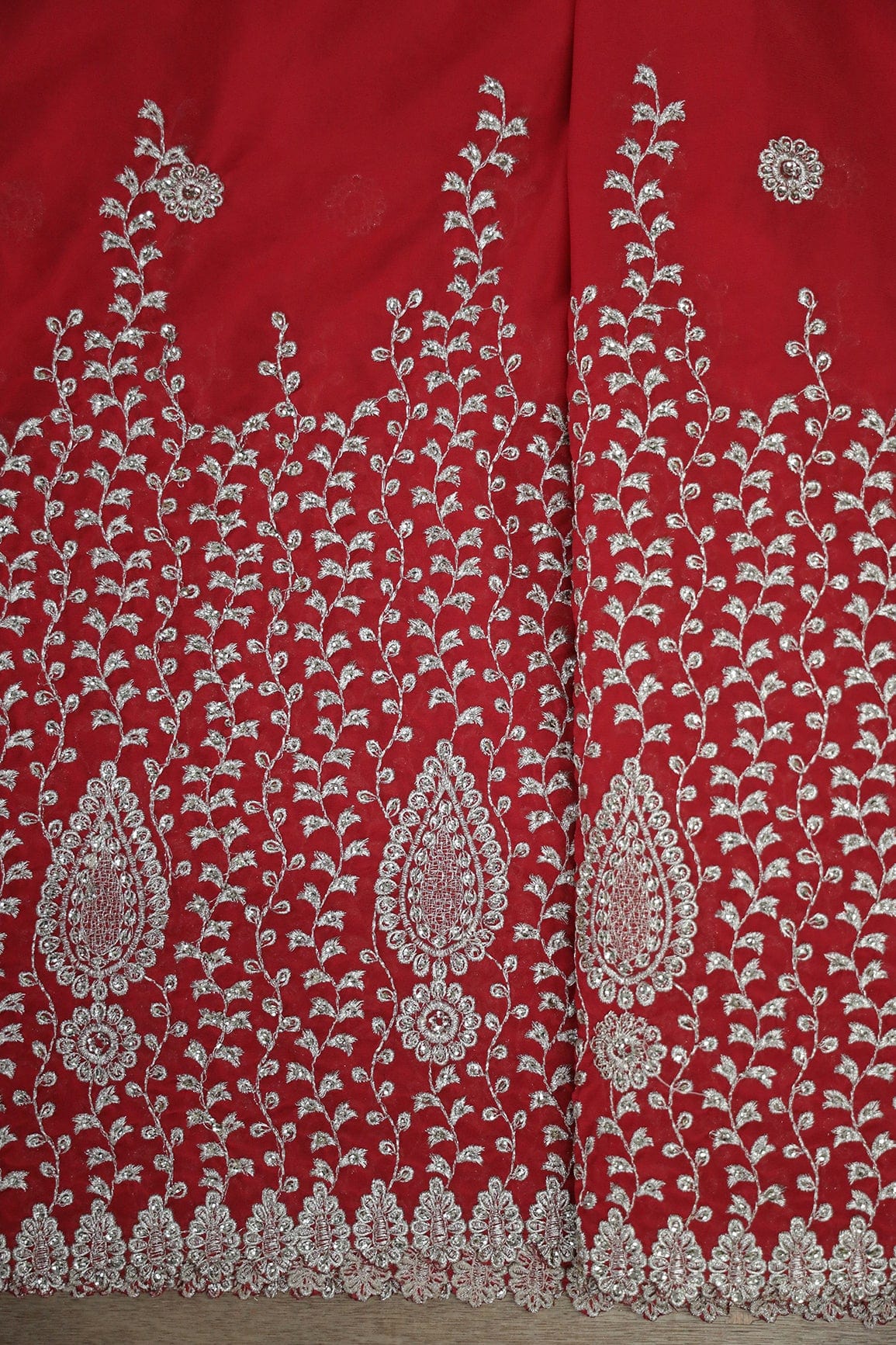 AIzaSyBcstauz-XMPRhEY21AUzeo032pxrXB5Ug - Big Width''56'' Silver Zari Leafy Embroidery Work On Red Georgette Fabric With Border