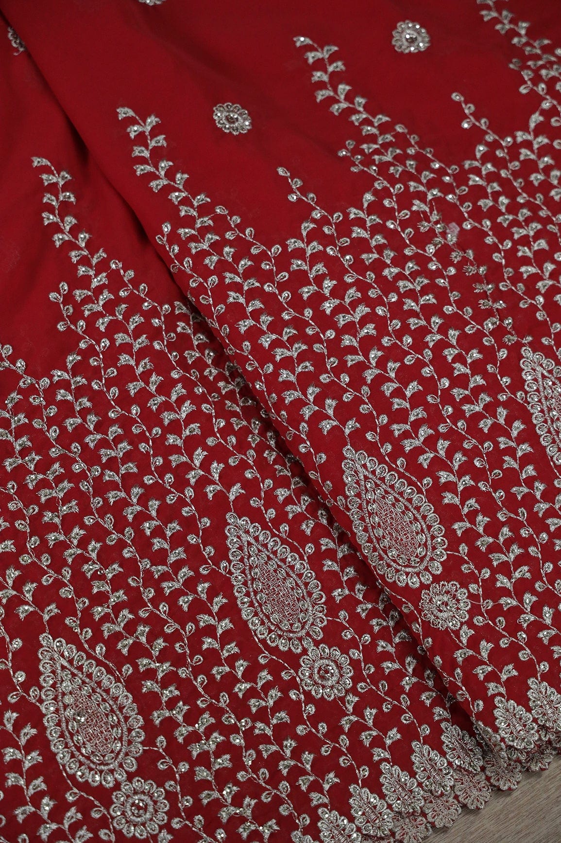 AIzaSyBcstauz-XMPRhEY21AUzeo032pxrXB5Ug - Big Width''56'' Silver Zari Leafy Embroidery Work On Red Georgette Fabric With Border