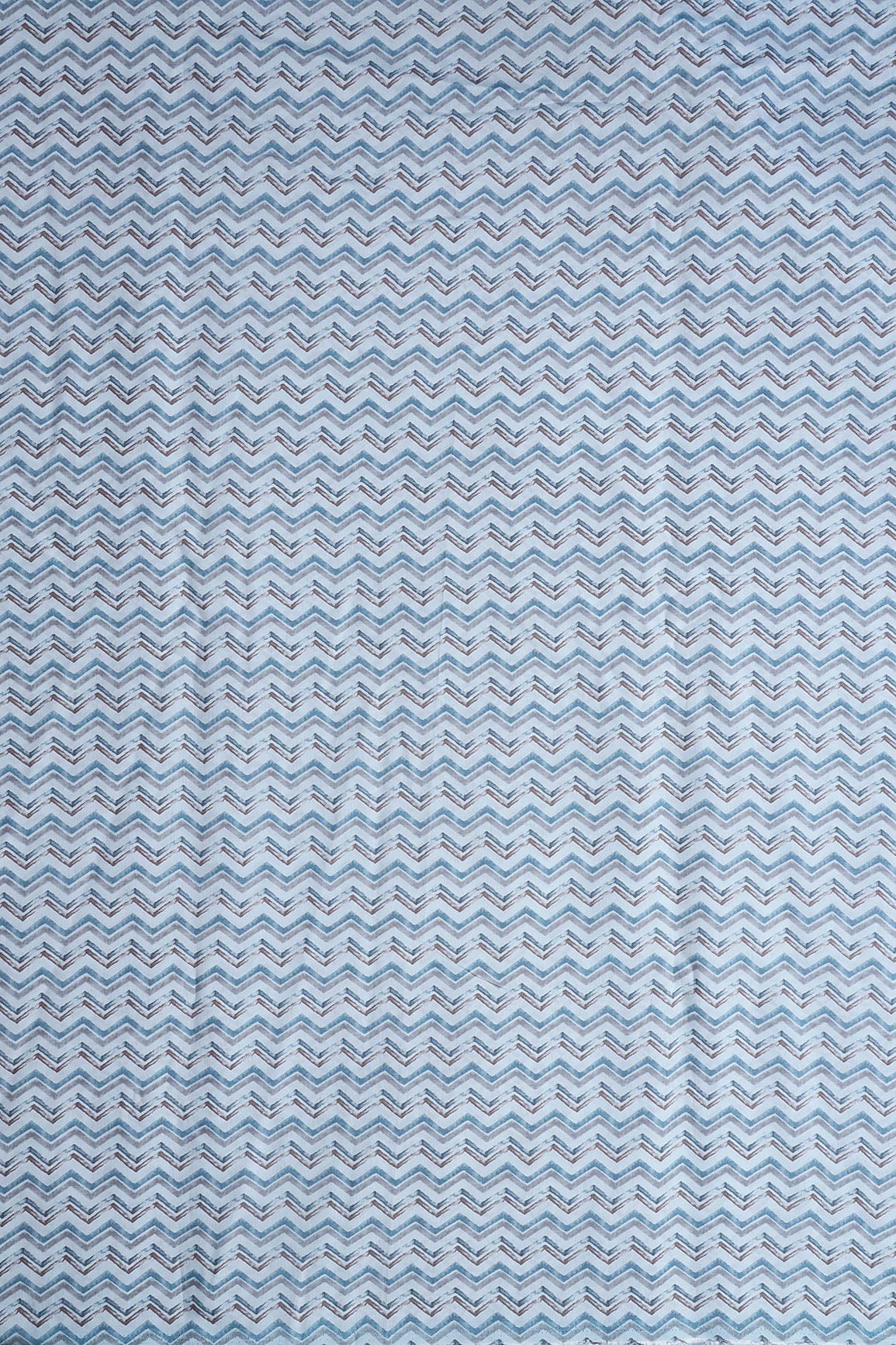 AIzaSyBcstauz-XMPRhEY21AUzeo032pxrXB5Ug - Blue And Brown Chevron Print On Pastel Blue Viscose Chanderi Silk Fabric