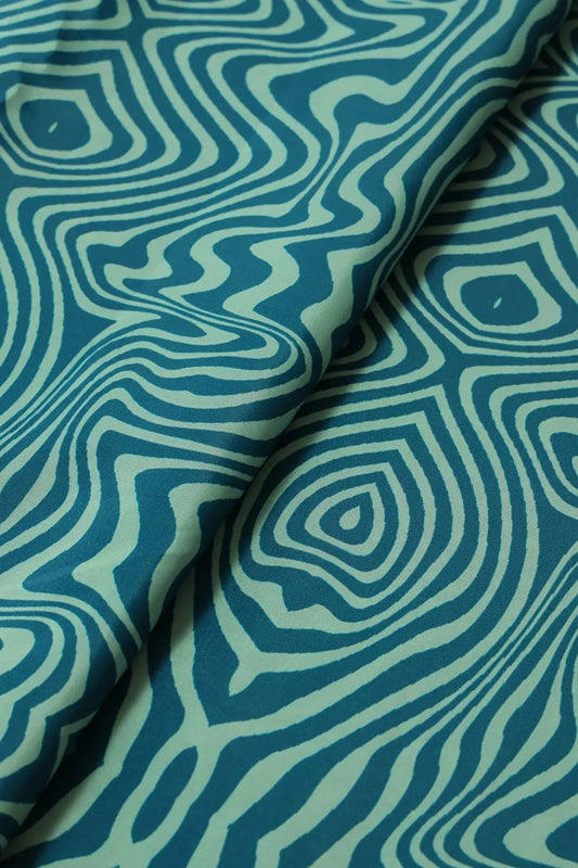 AIzaSyBcstauz-XMPRhEY21AUzeo032pxrXB5Ug - Blue And Off White Geometric Pattern Digital Print On French Crepe Fabric