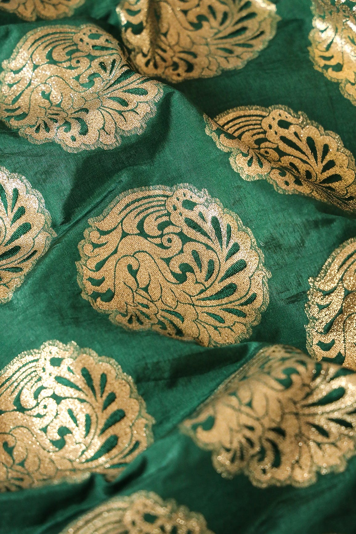AIzaSyBcstauz-XMPRhEY21AUzeo032pxrXB5Ug - Bottle Green Ethnic Butta Silk Gold Zari Banarasi Jacquard Fabric