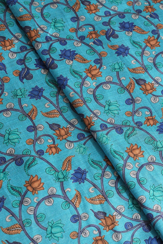 AIzaSyBcstauz-XMPRhEY21AUzeo032pxrXB5Ug - Brown And Blue Color Floral Pattern Digital Print On Cerulean Blue Mulberry Silk Fabric