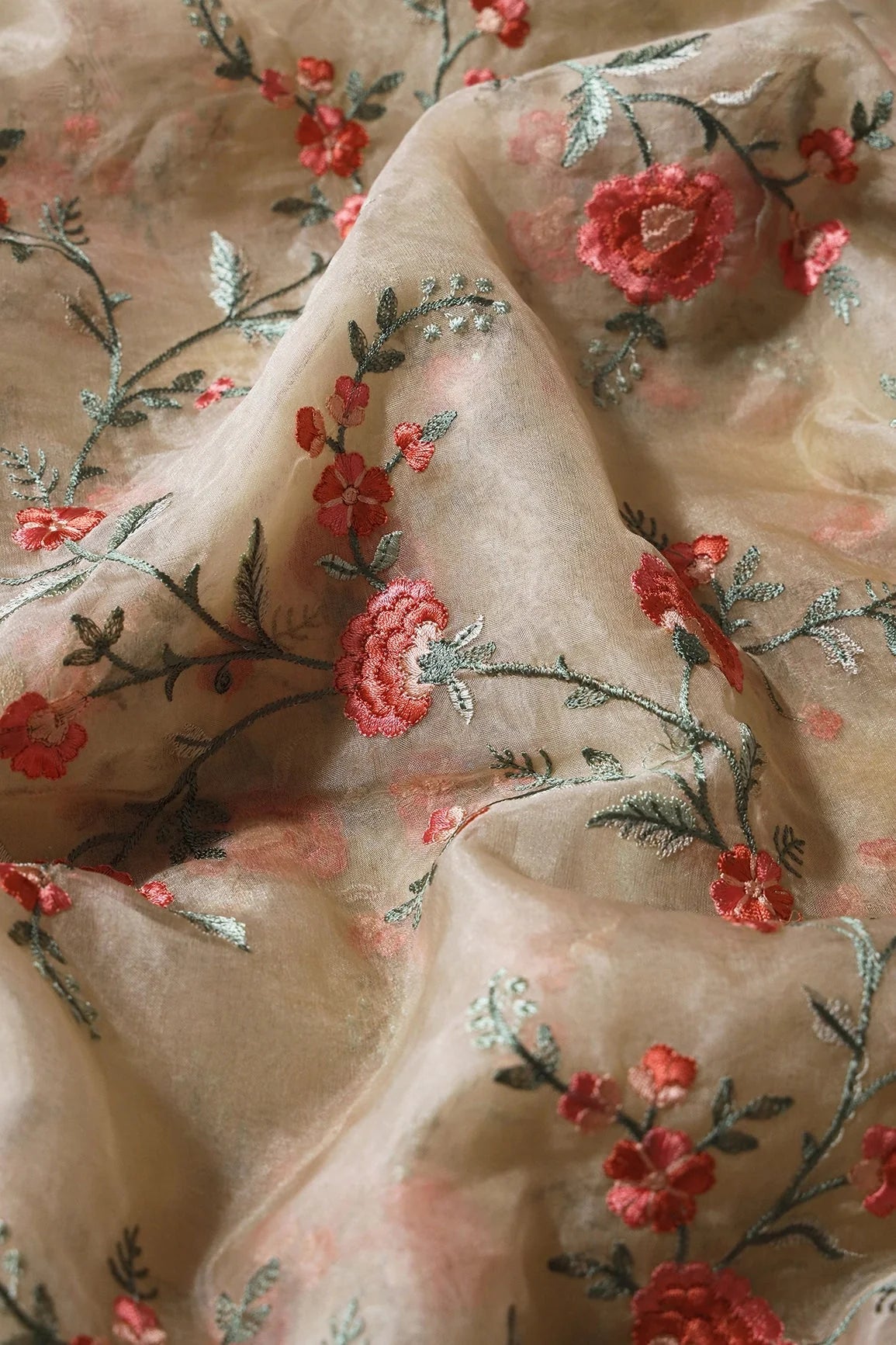 AIzaSyBcstauz-XMPRhEY21AUzeo032pxrXB5Ug - Brown And Light Green Thread Floral Embroidery Work On Light Beige Organza Fabric