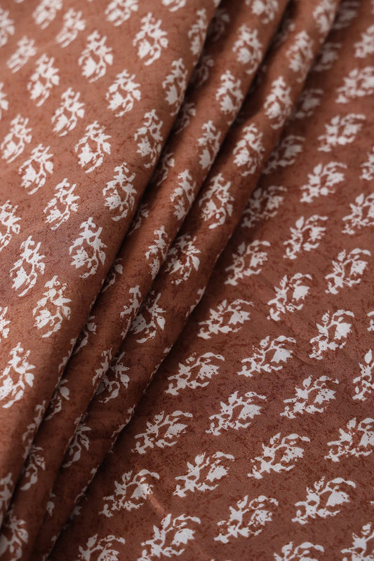AIzaSyBcstauz-XMPRhEY21AUzeo032pxrXB5Ug - Brown And White Small Floral Pattern Screen Print On Pure Muslin Silk Fabric
