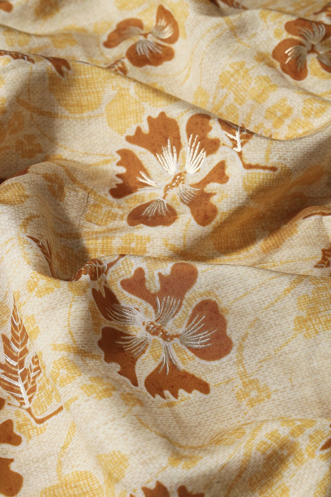 AIzaSyBcstauz-XMPRhEY21AUzeo032pxrXB5Ug - Cream And Light Brown Floral Foil Print On Viscose Chanderi Silk Fabric