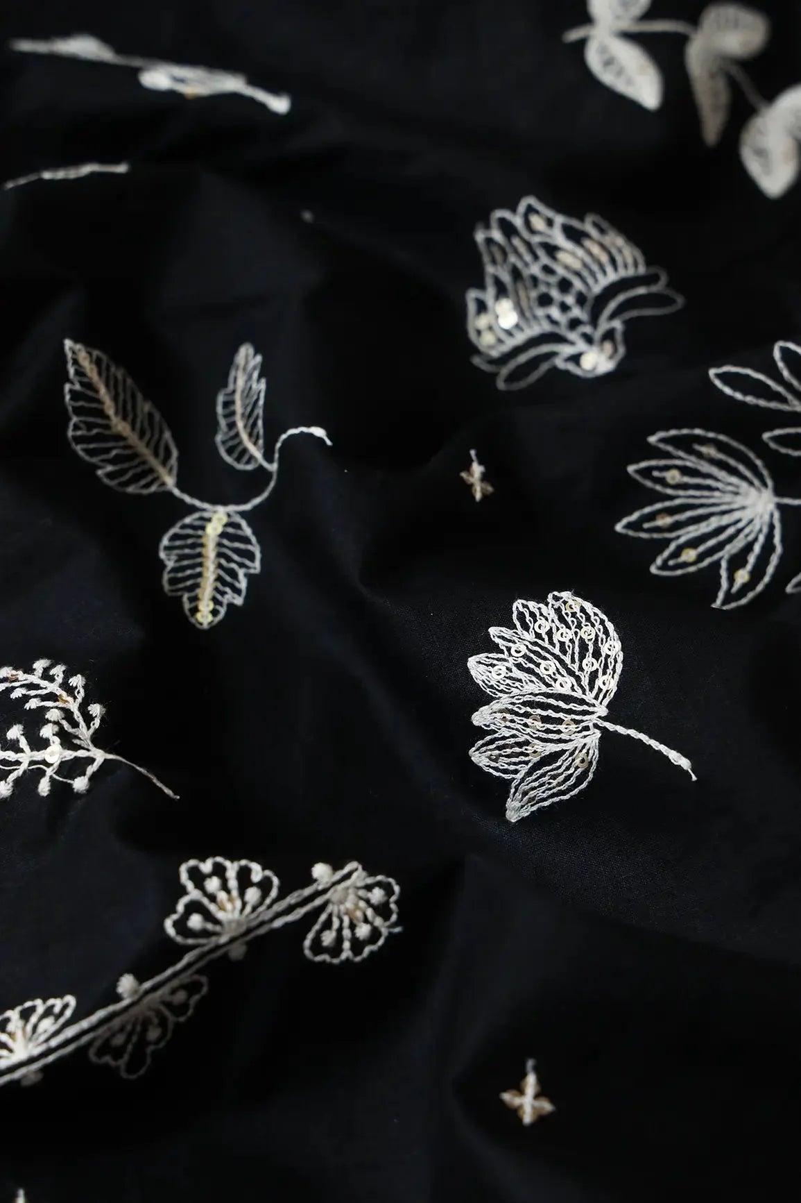 AIzaSyBcstauz-XMPRhEY21AUzeo032pxrXB5Ug - Cream Thread With Gold Sequins Floral Embroidery Work On Black Cotton Cambric Fabric