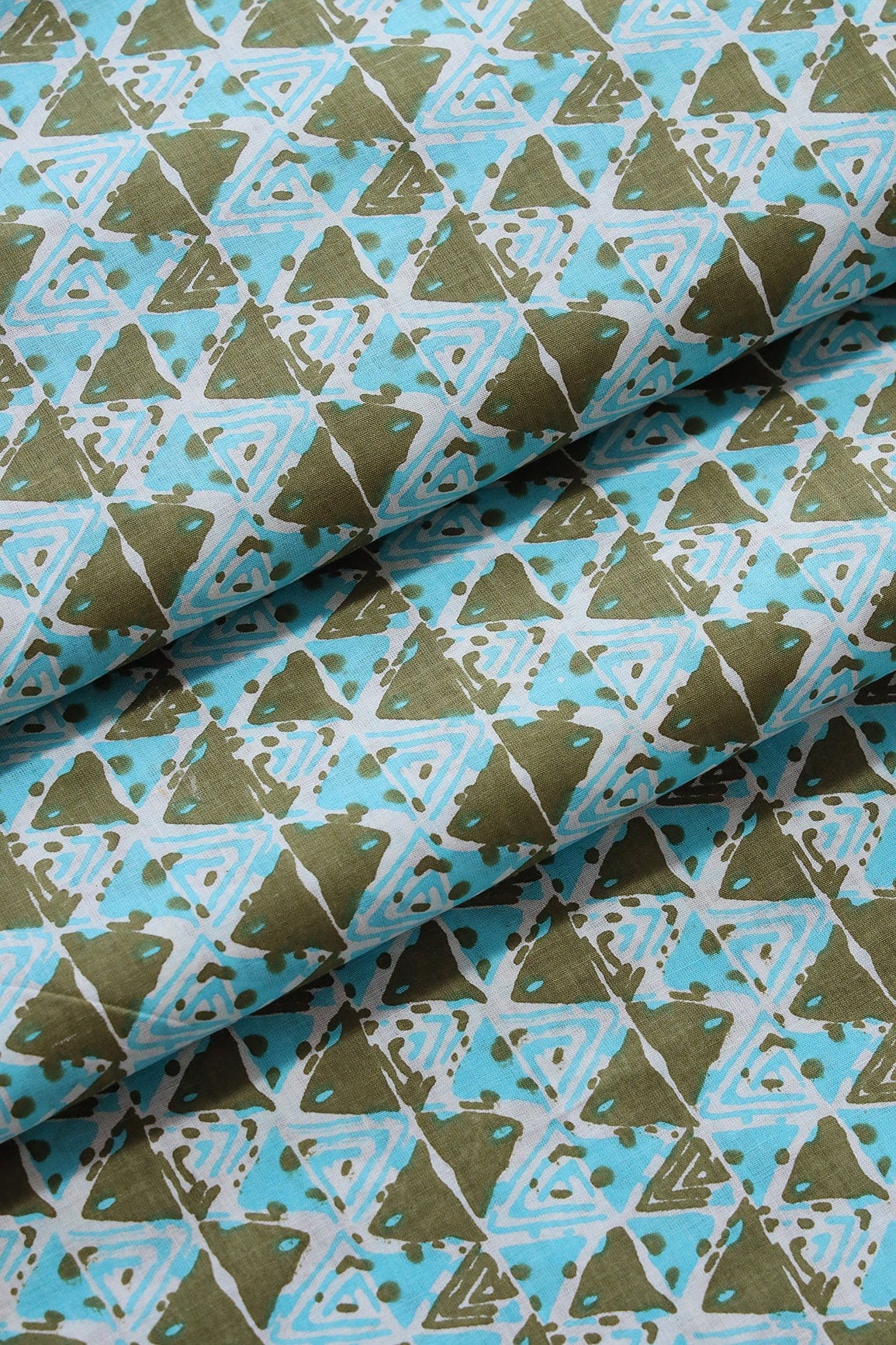 AIzaSyBcstauz-XMPRhEY21AUzeo032pxrXB5Ug - Dark Olive And Sky Blue Geometric Pattern Print On White Pure Cotton Fabric