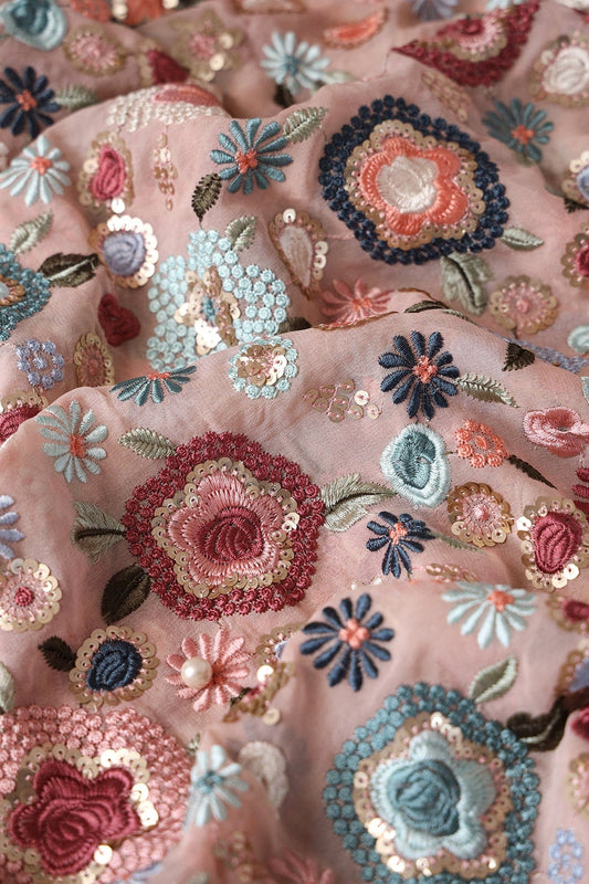 AIzaSyBcstauz-XMPRhEY21AUzeo032pxrXB5Ug - Elegant Floral Heavy Embroidery With Gold Sequins On Peach Viscose Georgette Fabric