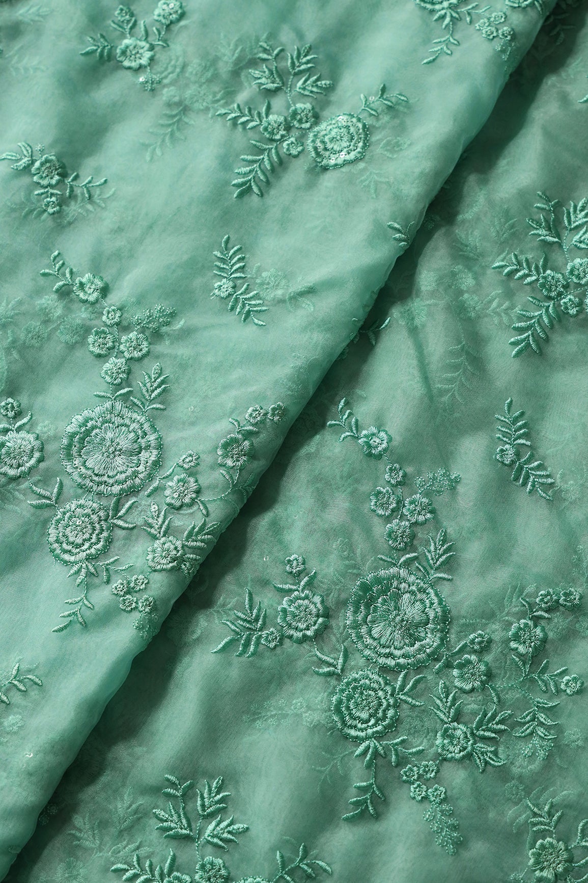 AIzaSyBcstauz-XMPRhEY21AUzeo032pxrXB5Ug - Elegant Floral Thread With Water Sequins Embroidery On Teal Organza Fabric