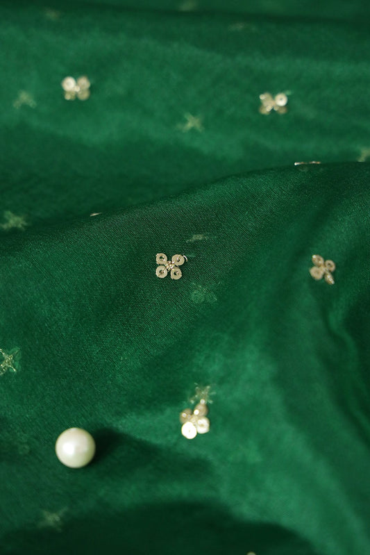AIzaSyBcstauz-XMPRhEY21AUzeo032pxrXB5Ug - Gold Sequins Small Motif Embroidery Work On Bottle Green Organza Fabric