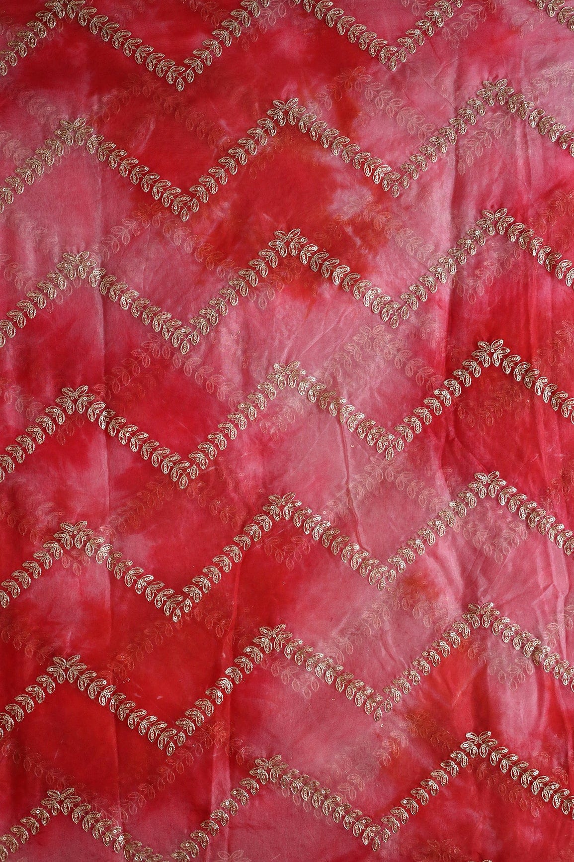 AIzaSyBcstauz-XMPRhEY21AUzeo032pxrXB5Ug - Gold Zari With Gold Sequins Chevron Embroidery Work On Tie & Dye Red Organza Fabric