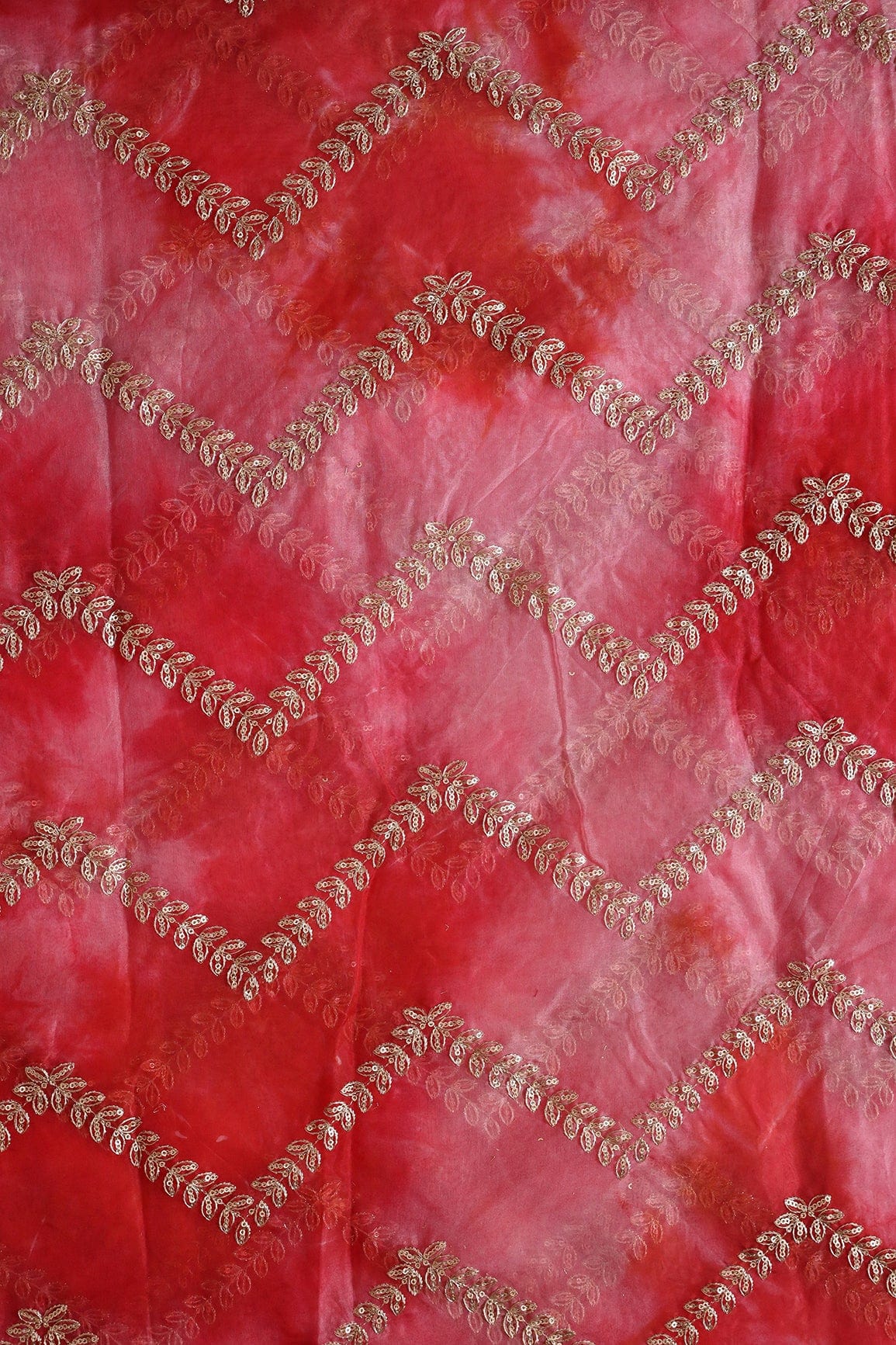 AIzaSyBcstauz-XMPRhEY21AUzeo032pxrXB5Ug - Gold Zari With Gold Sequins Chevron Embroidery Work On Tie & Dye Red Organza Fabric