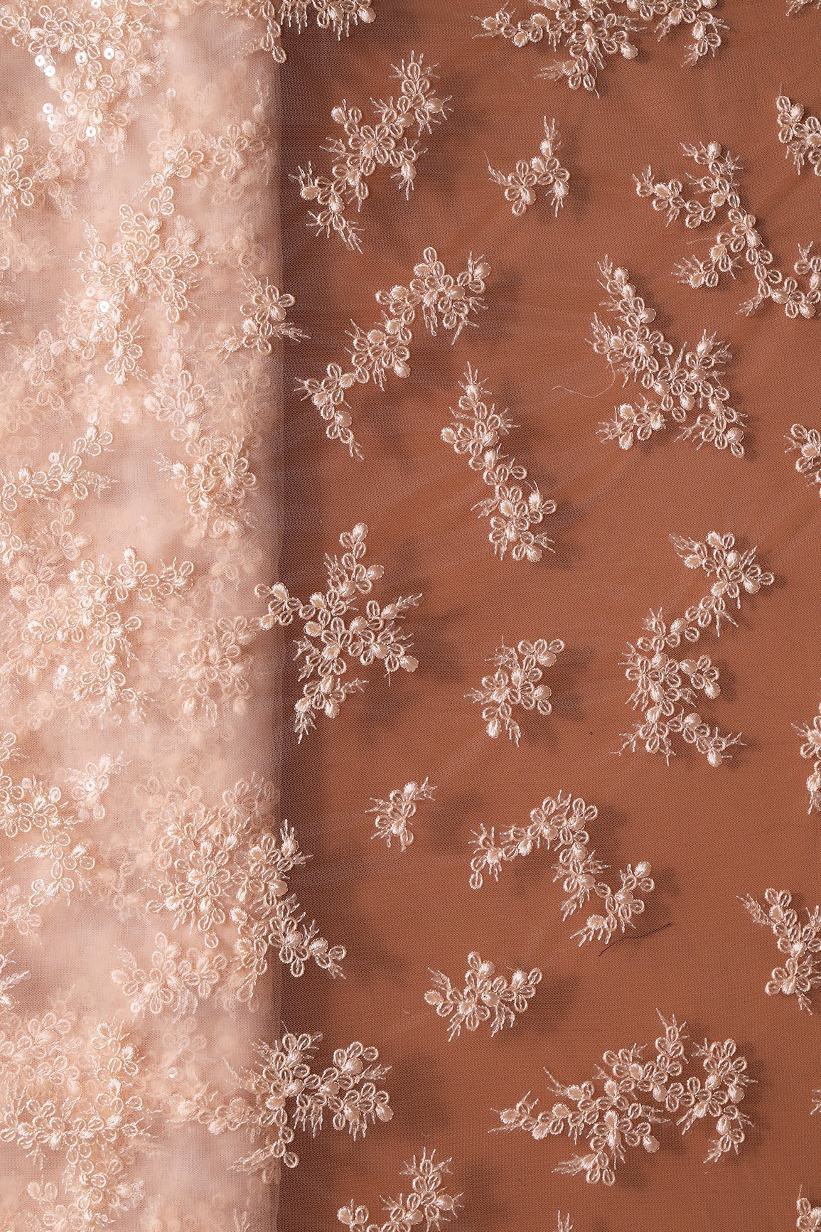 AIzaSyBcstauz-XMPRhEY21AUzeo032pxrXB5Ug - Exclusive Peach Thread With Sequins Abstract Embroidery Work On Light Peach Soft Net Fabric