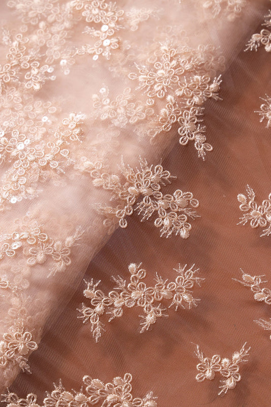 AIzaSyBcstauz-XMPRhEY21AUzeo032pxrXB5Ug - Exclusive Peach Thread With Sequins Abstract Embroidery Work On Light Peach Soft Net Fabric