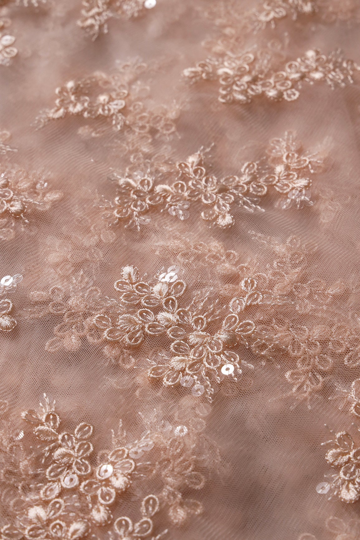 AIzaSyBcstauz-XMPRhEY21AUzeo032pxrXB5Ug - Exclusive Peach Thread With Sequins Abstract Embroidery Work On Light Peach Soft Net Fabric