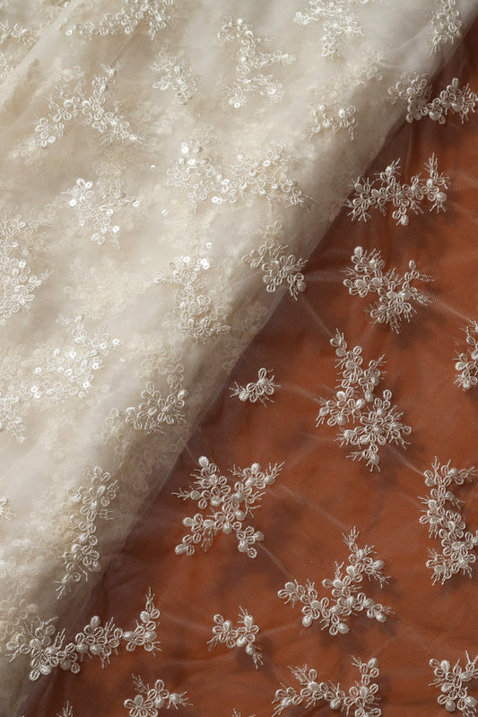 AIzaSyBcstauz-XMPRhEY21AUzeo032pxrXB5Ug - Exclusive White Thread With Sequins Abstract Embroidery Work On Dyeable White Soft Net Fabric