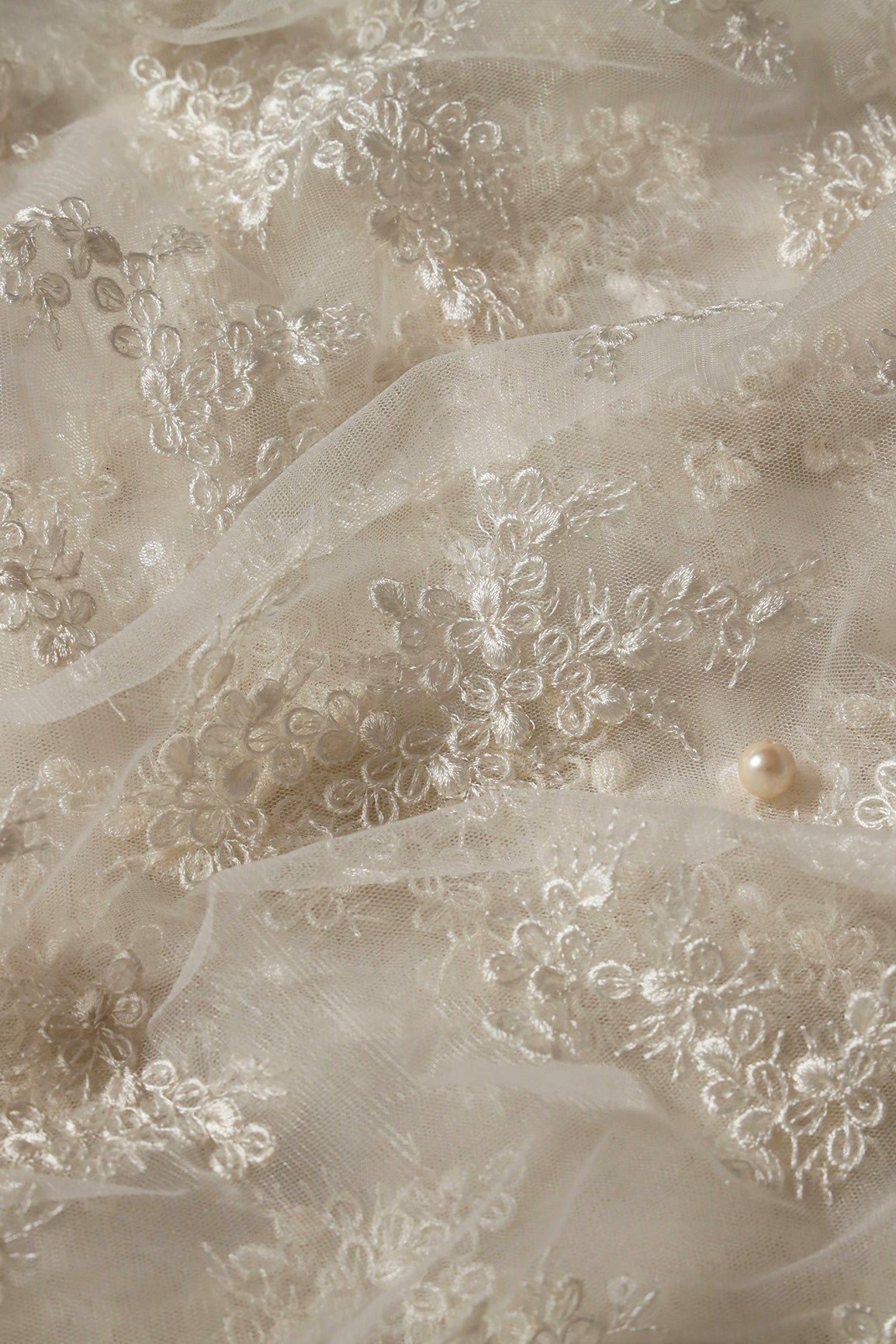 AIzaSyBcstauz-XMPRhEY21AUzeo032pxrXB5Ug - Exclusive White Thread With Sequins Abstract Embroidery Work On Dyeable White Soft Net Fabric