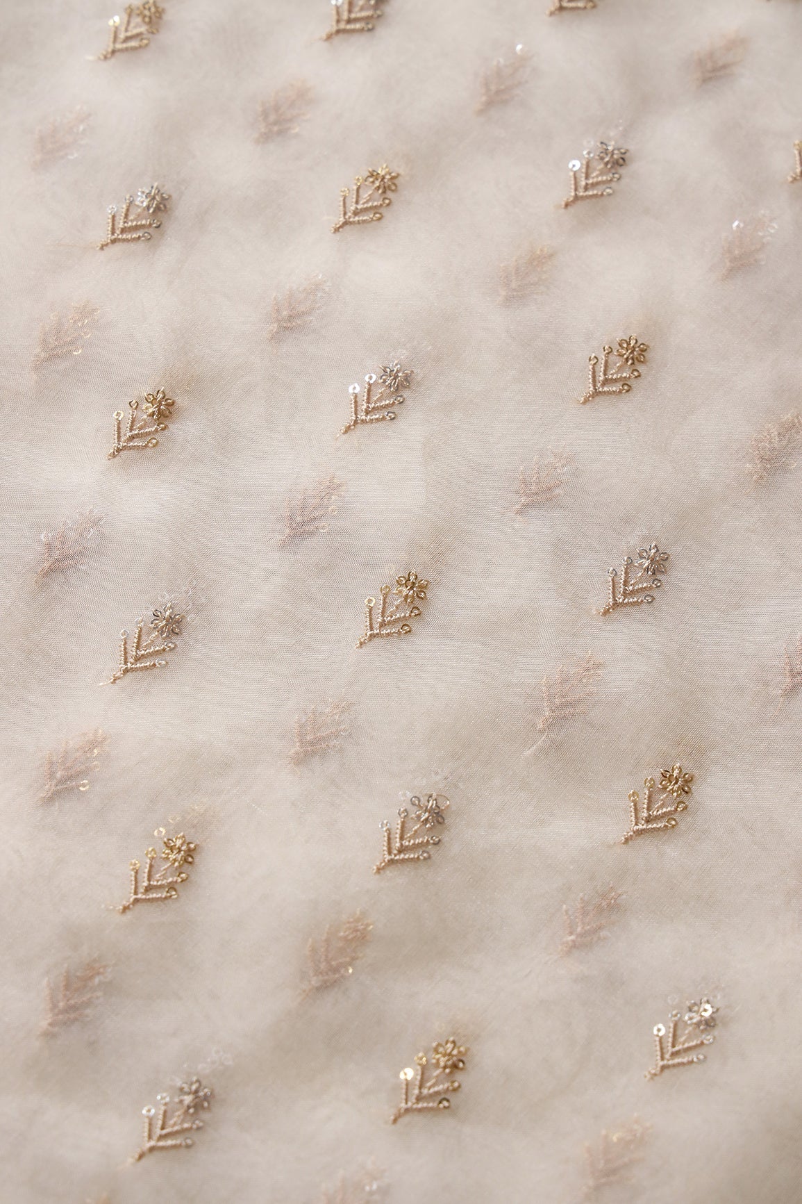 AIzaSyBcstauz-XMPRhEY21AUzeo032pxrXB5Ug - Gold And Silver Sequins Beautiful Small Floral Motif Embroidery Work On Cream Organza Fabric