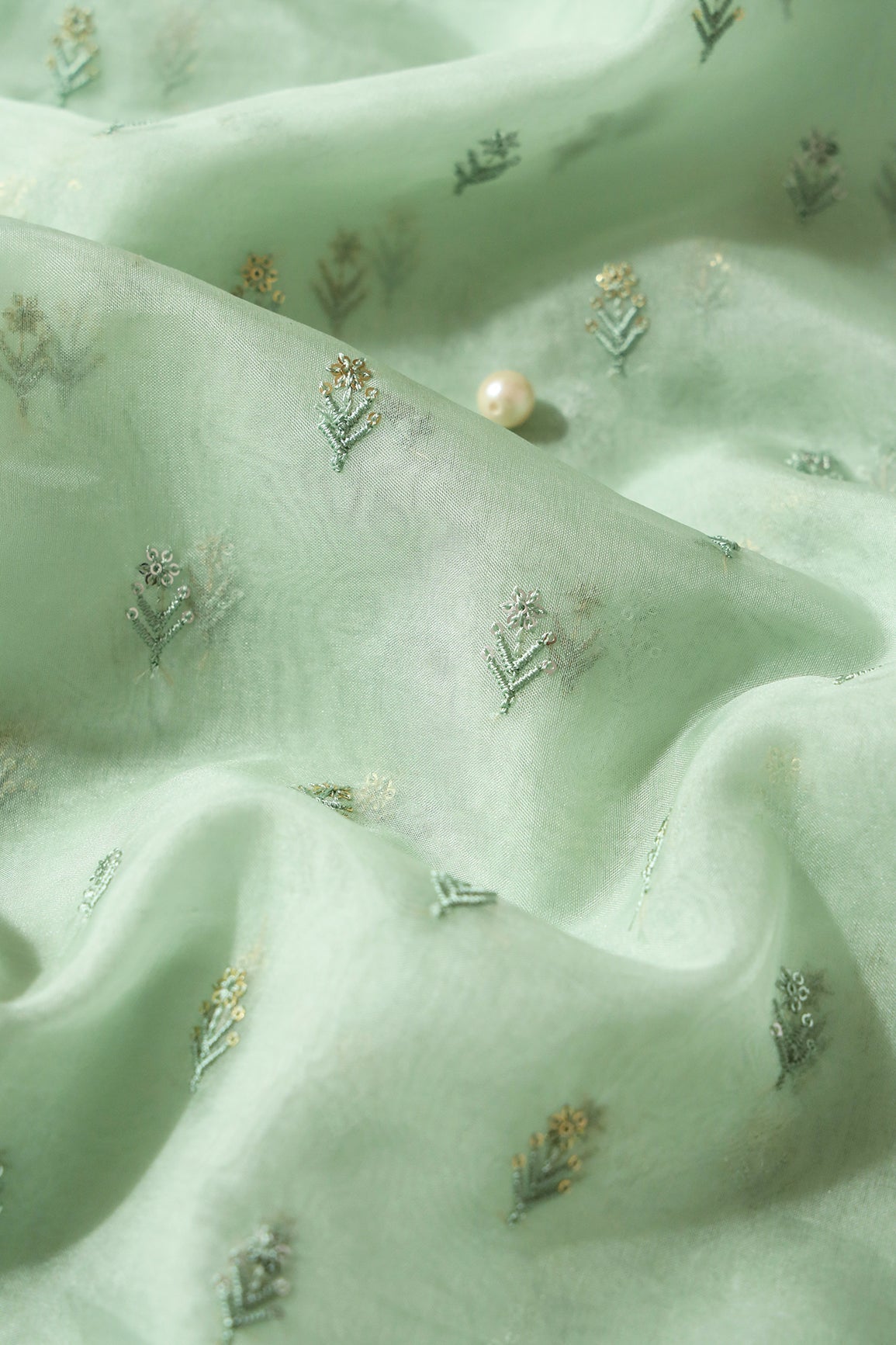 AIzaSyBcstauz-XMPRhEY21AUzeo032pxrXB5Ug - Gold And Silver Sequins Beautiful Small Floral Motif Embroidery Work On Pastel Olive Organza Fabric