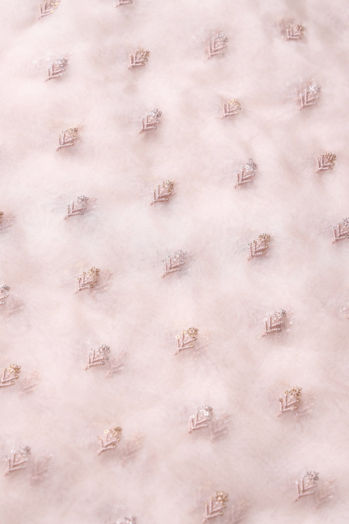 AIzaSyBcstauz-XMPRhEY21AUzeo032pxrXB5Ug - Gold And Silver Sequins Beautiful Small Floral Motif Embroidery Work On Pastel Peach Organza Fabric
