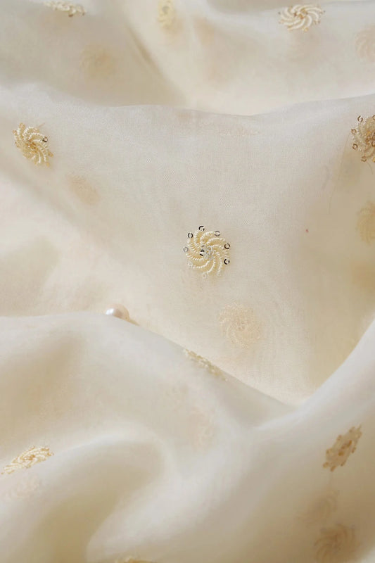 AIzaSyBcstauz-XMPRhEY21AUzeo032pxrXB5Ug - Gold And Silver Sequins Beautiful Small Motif Embroidery Work On Cream Organza Fabric