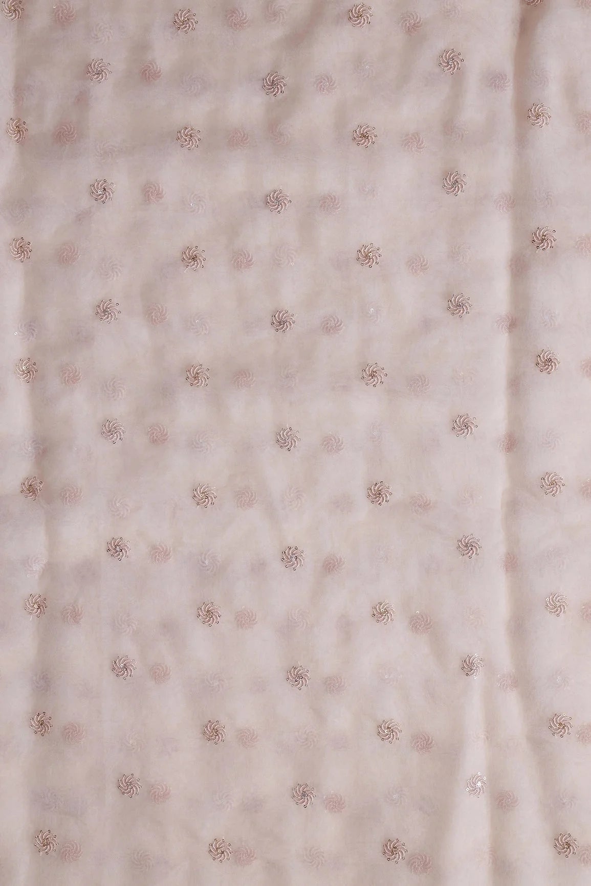 AIzaSyBcstauz-XMPRhEY21AUzeo032pxrXB5Ug - Gold And Silver Sequins Beautiful Small Motif Embroidery Work On Pastel Peach Organza Fabric