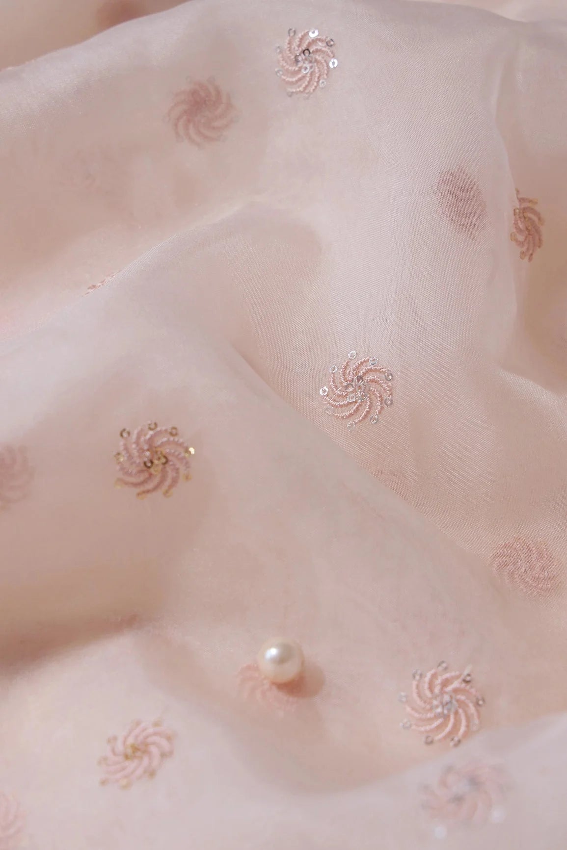 AIzaSyBcstauz-XMPRhEY21AUzeo032pxrXB5Ug - Gold And Silver Sequins Beautiful Small Motif Embroidery Work On Pastel Peach Organza Fabric