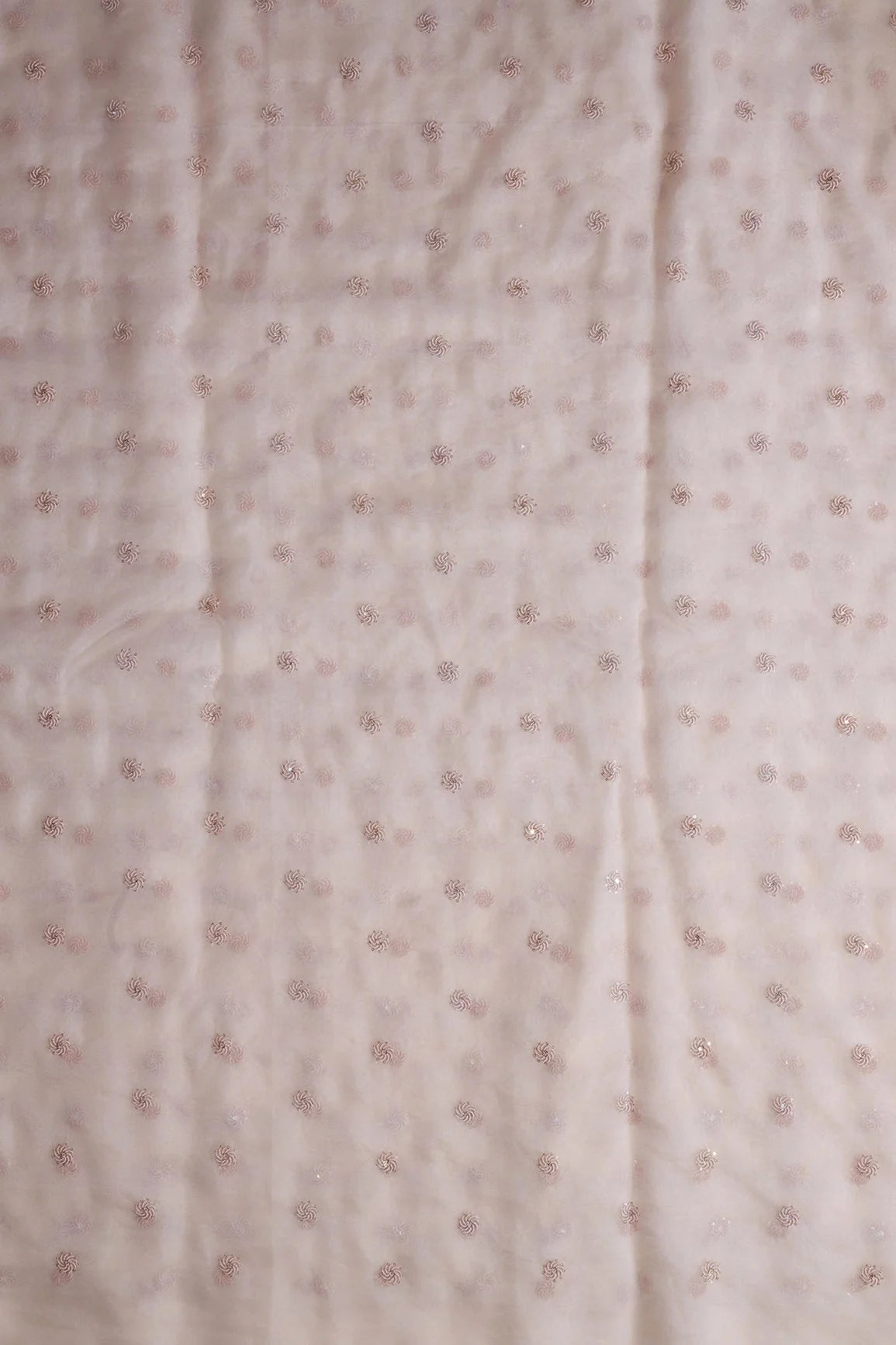 AIzaSyBcstauz-XMPRhEY21AUzeo032pxrXB5Ug - Gold And Silver Sequins Beautiful Small Motif Embroidery Work On Pastel Peach Organza Fabric