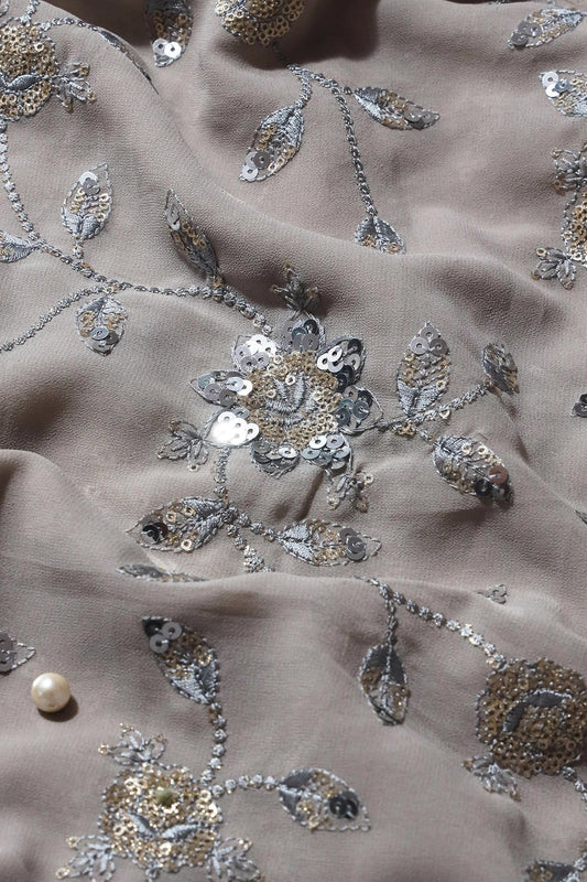 AIzaSyBcstauz-XMPRhEY21AUzeo032pxrXB5Ug - Gold And Silver Sequins Floral Embroidery Work On Grey Georgette Fabric