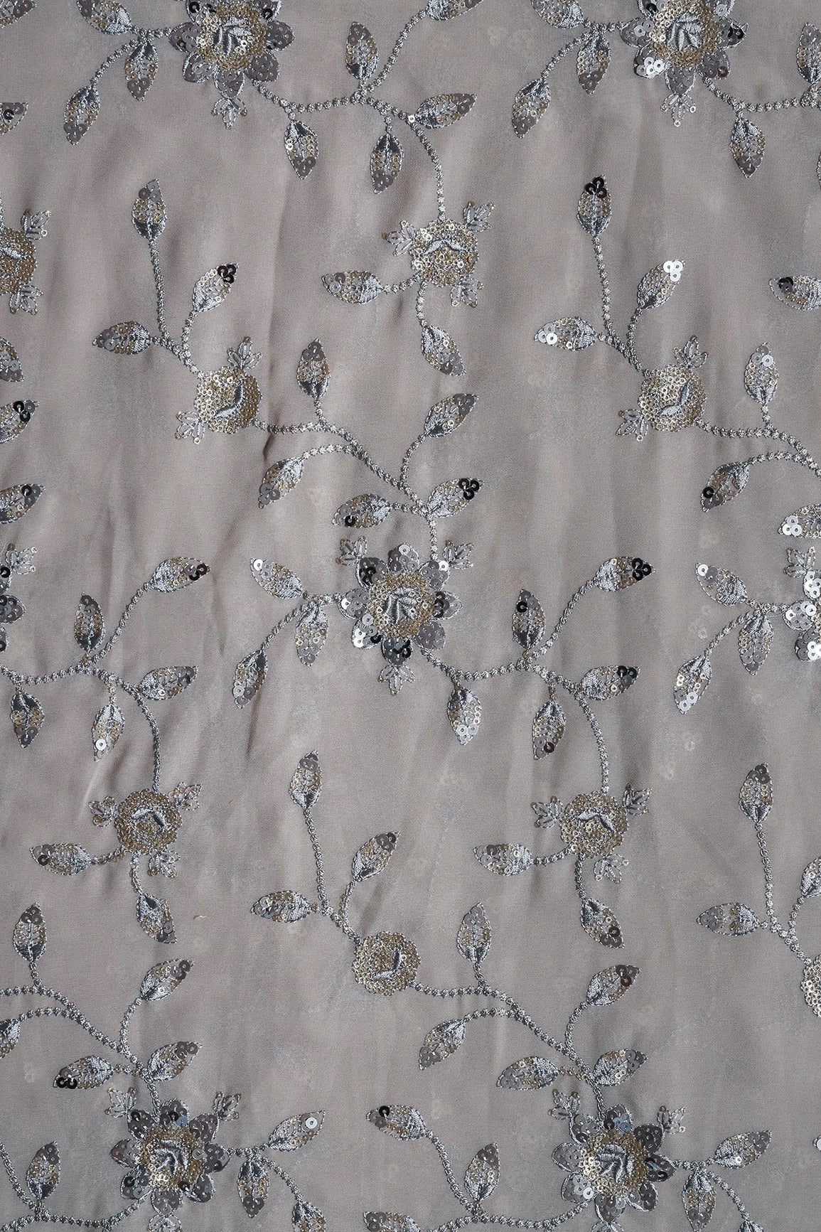 AIzaSyBcstauz-XMPRhEY21AUzeo032pxrXB5Ug - Gold And Silver Sequins Floral Embroidery Work On Grey Georgette Fabric