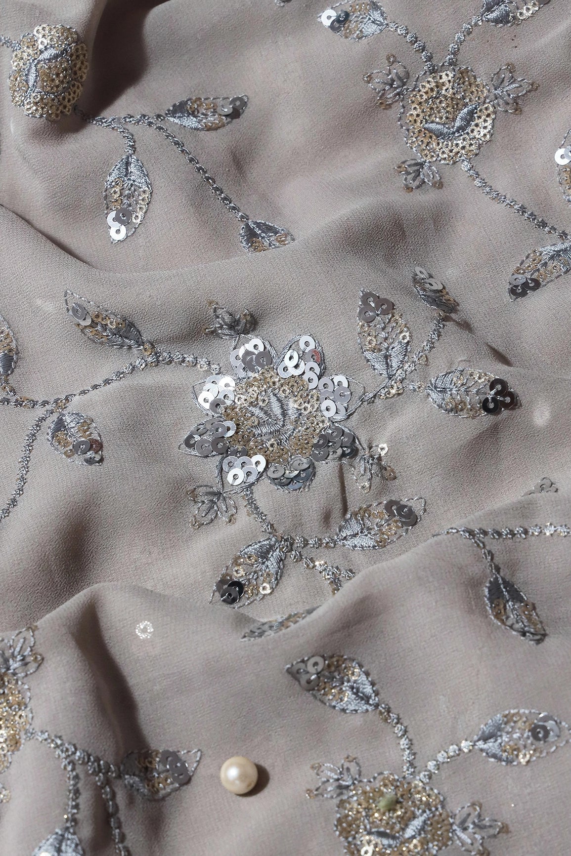 AIzaSyBcstauz-XMPRhEY21AUzeo032pxrXB5Ug - Gold And Silver Sequins Floral Embroidery Work On Grey Georgette Fabric
