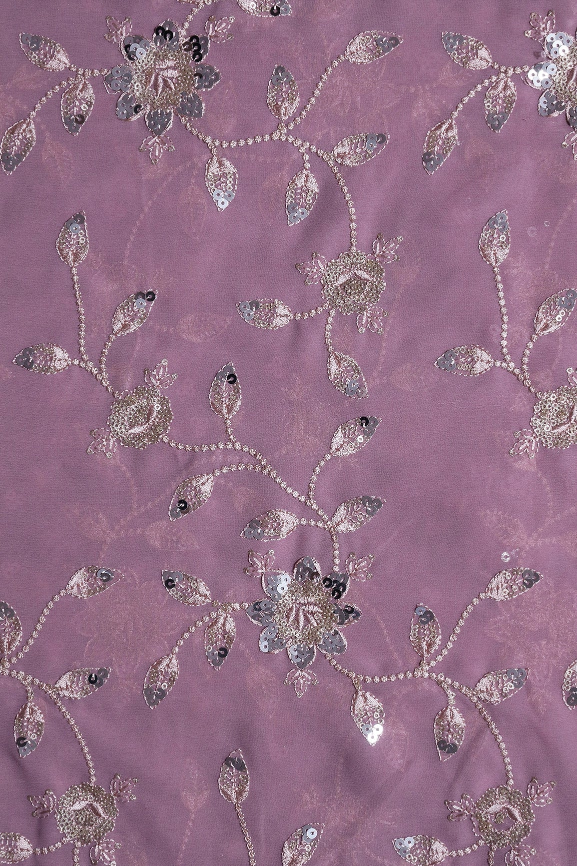 AIzaSyBcstauz-XMPRhEY21AUzeo032pxrXB5Ug - Gold And Silver Sequins Floral Embroidery Work On Lilac Purple Georgette Fabric