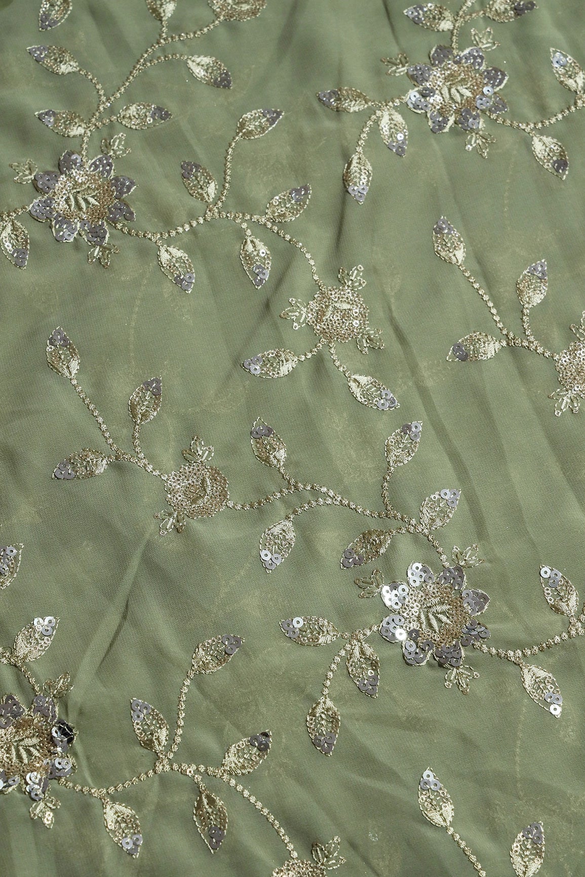 AIzaSyBcstauz-XMPRhEY21AUzeo032pxrXB5Ug - Gold And Silver Sequins Floral Embroidery Work On Olive Georgette Fabric