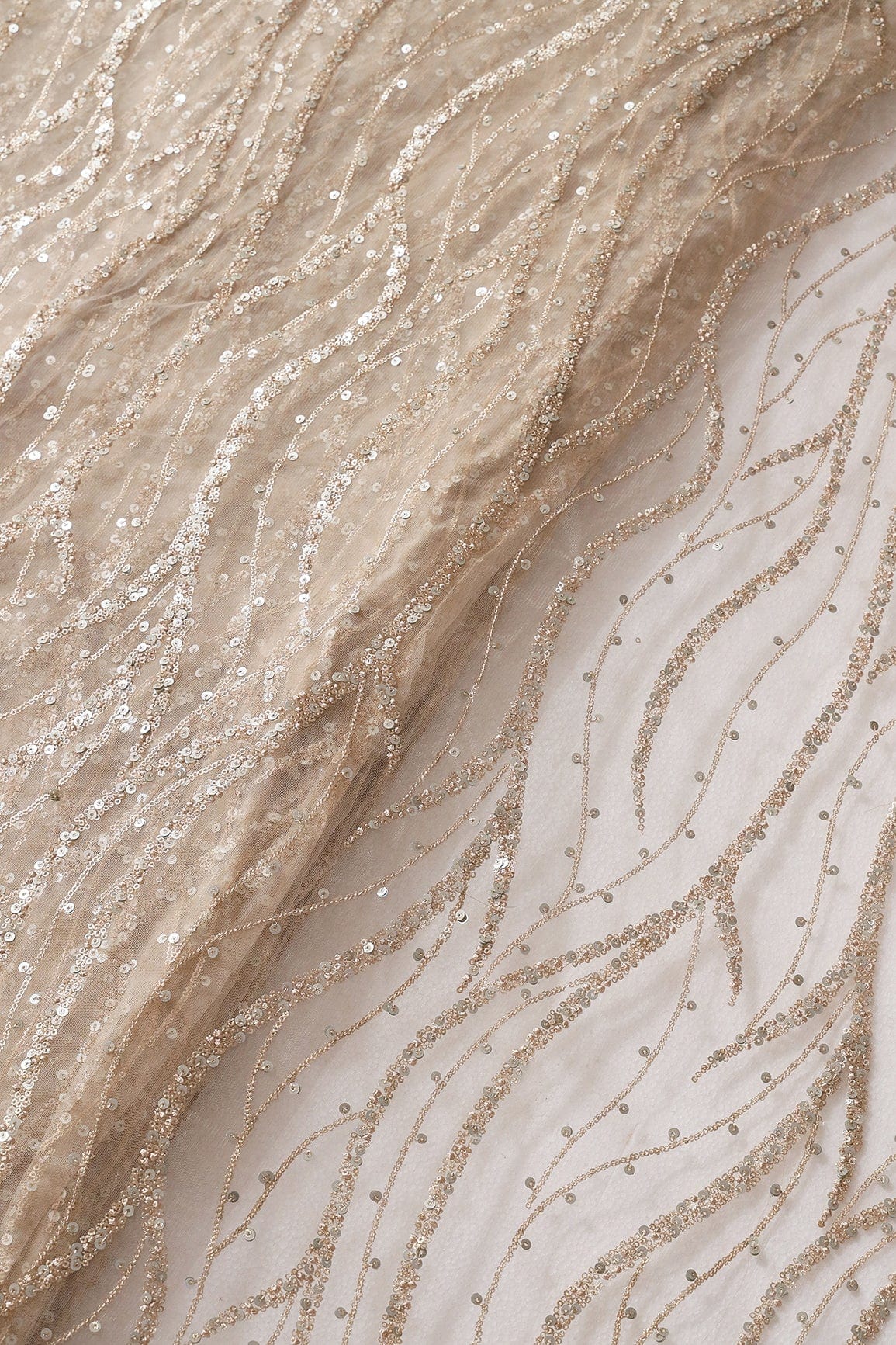 AIzaSyBcstauz-XMPRhEY21AUzeo032pxrXB5Ug - Gold And Silver Sequins With Beige Thread Wavy Embroidery On Light Beige Soft Net