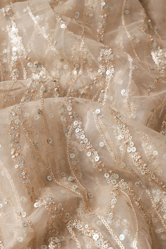 AIzaSyBcstauz-XMPRhEY21AUzeo032pxrXB5Ug - Gold And Silver Sequins With Beige Thread Wavy Embroidery On Light Beige Soft Net