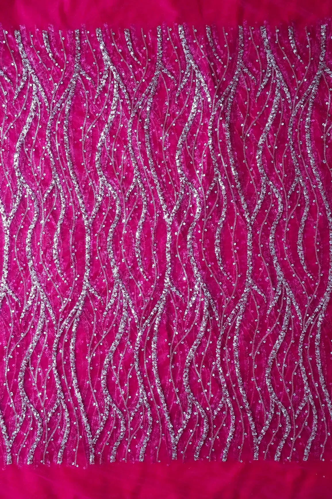 AIzaSyBcstauz-XMPRhEY21AUzeo032pxrXB5Ug - Gold And Silver Sequins With Fuchsia Thread Wavy Embroidery Work On Fuchsia Soft Net Fabric