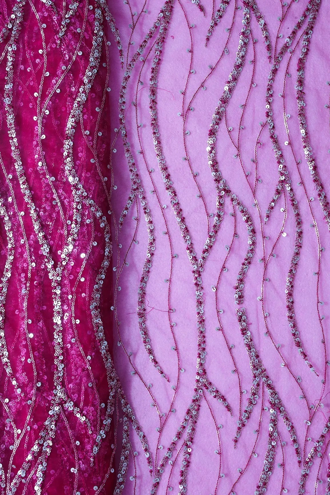 AIzaSyBcstauz-XMPRhEY21AUzeo032pxrXB5Ug - Gold And Silver Sequins With Fuchsia Thread Wavy Embroidery Work On Fuchsia Soft Net Fabric