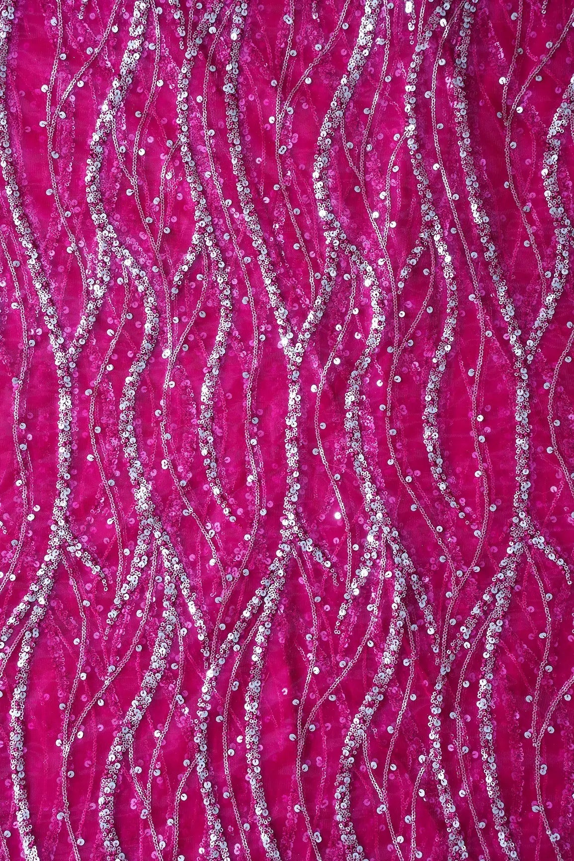 AIzaSyBcstauz-XMPRhEY21AUzeo032pxrXB5Ug - Gold And Silver Sequins With Fuchsia Thread Wavy Embroidery Work On Fuchsia Soft Net Fabric