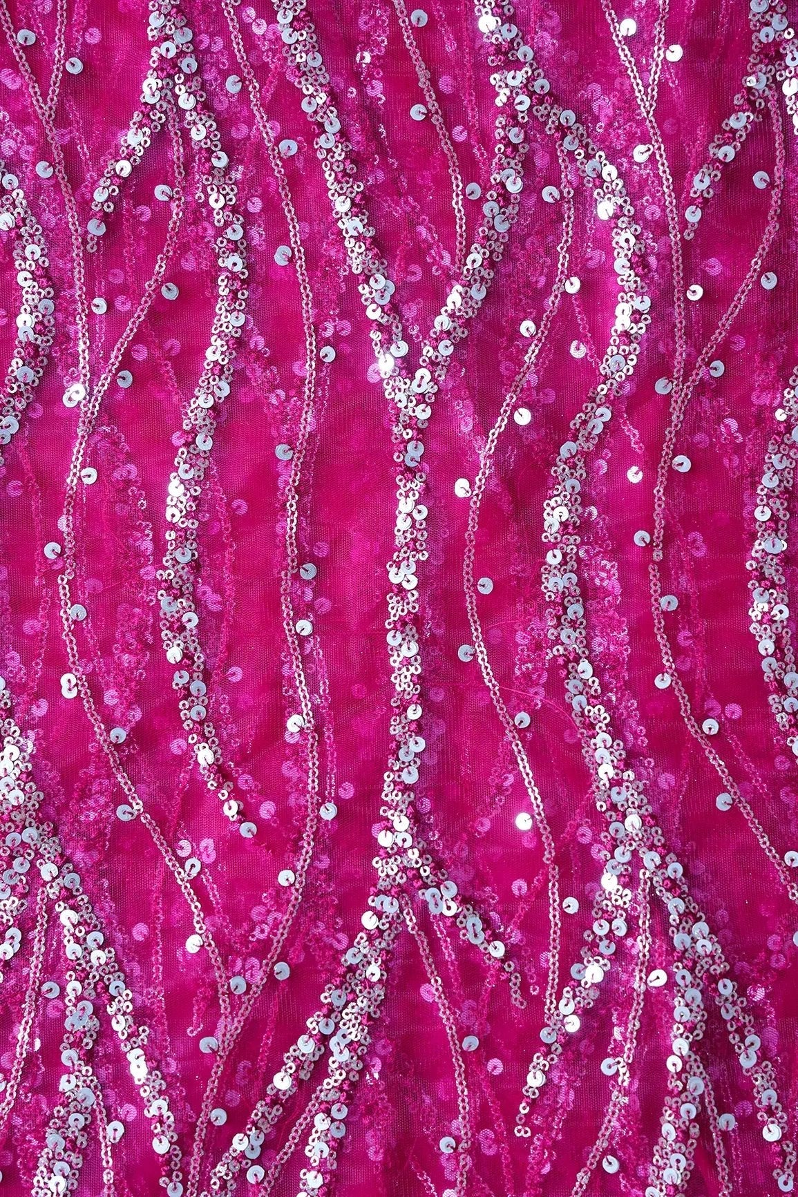 AIzaSyBcstauz-XMPRhEY21AUzeo032pxrXB5Ug - Gold And Silver Sequins With Fuchsia Thread Wavy Embroidery Work On Fuchsia Soft Net Fabric