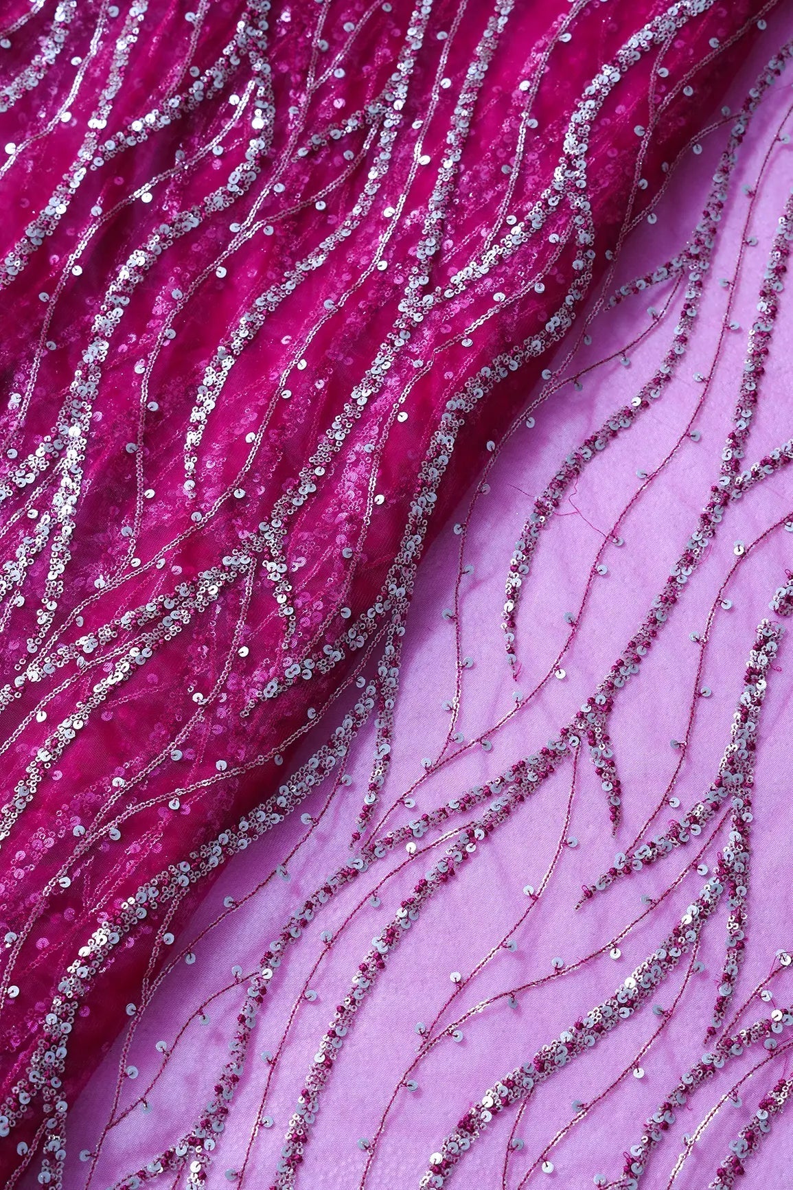 AIzaSyBcstauz-XMPRhEY21AUzeo032pxrXB5Ug - Gold And Silver Sequins With Fuchsia Thread Wavy Embroidery Work On Fuchsia Soft Net Fabric