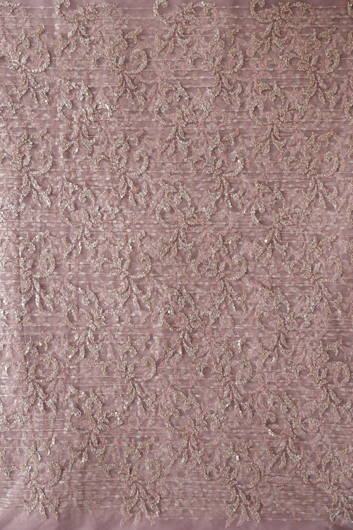 AIzaSyBcstauz-XMPRhEY21AUzeo032pxrXB5Ug - Gold And Silver Sequins With Mauve Thread Abstract Embroidery Work On Mauve Soft Net Fabric