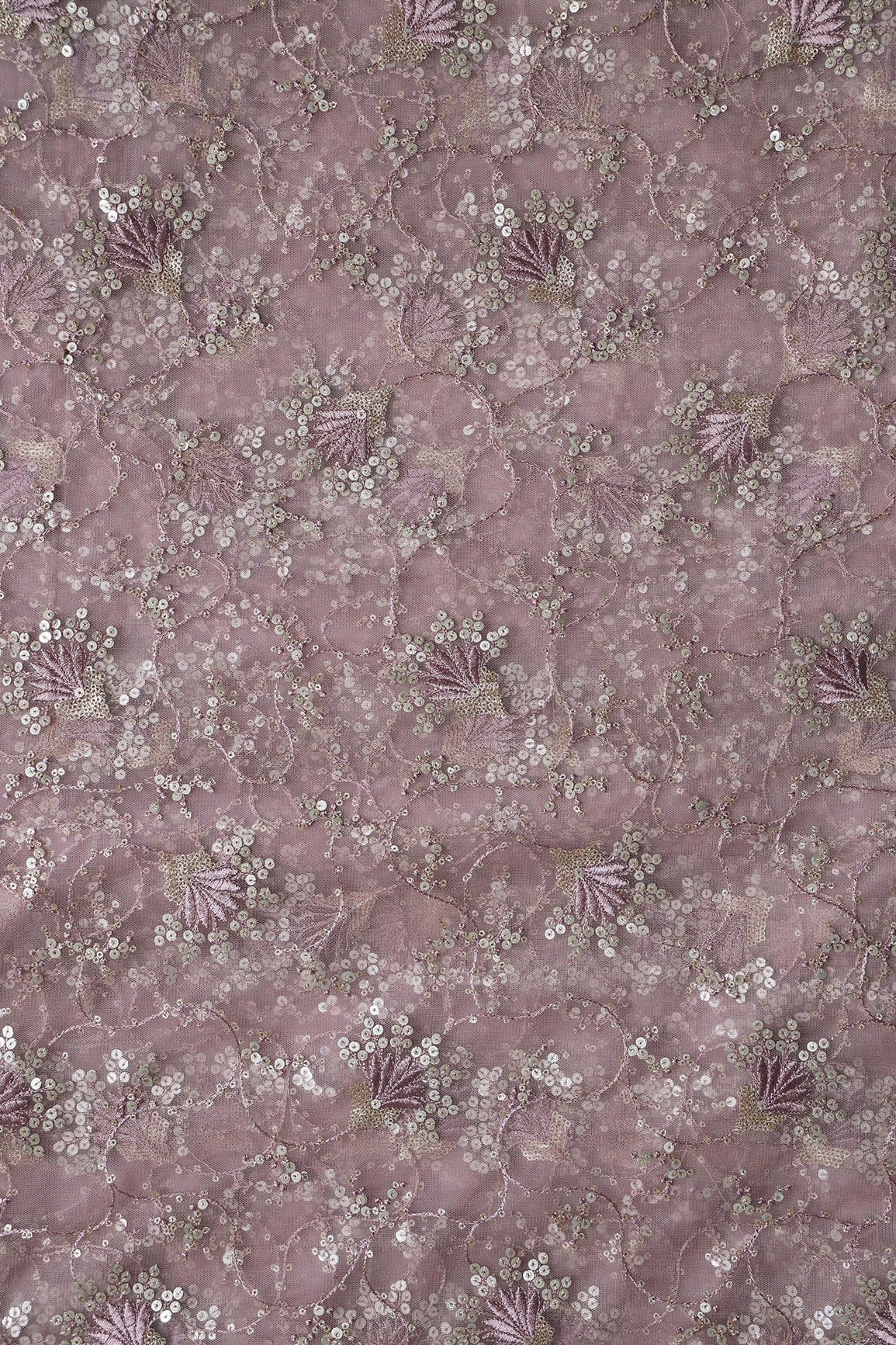 AIzaSyBcstauz-XMPRhEY21AUzeo032pxrXB5Ug - Gold And Silver Sequins With Mauve Thread Floral Embroidery Work On Mauve Soft Net Fabric