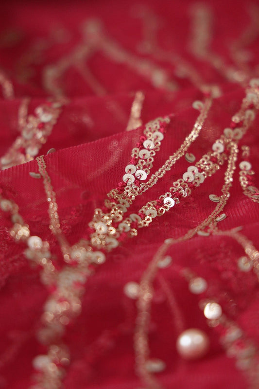AIzaSyBcstauz-XMPRhEY21AUzeo032pxrXB5Ug - Gold And Silver Sequins With Red Thread Wavy Embroidery Work On Cherry Red Soft Net Fabric